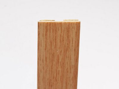 Perfiles plásticos para mueble y decoración, Polinter, S.A. Perfil unión suelos acabado madera.